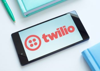 Two US tech stocks on the verge of initiating dividends: here’s what to watch