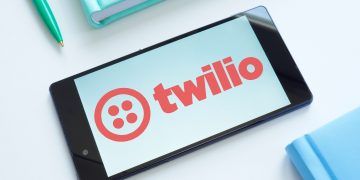 Two US tech stocks on the verge of initiating dividends: here’s what to watch