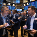 Dow Jones slips, S&P gains as oil surges and market volatility spikes
